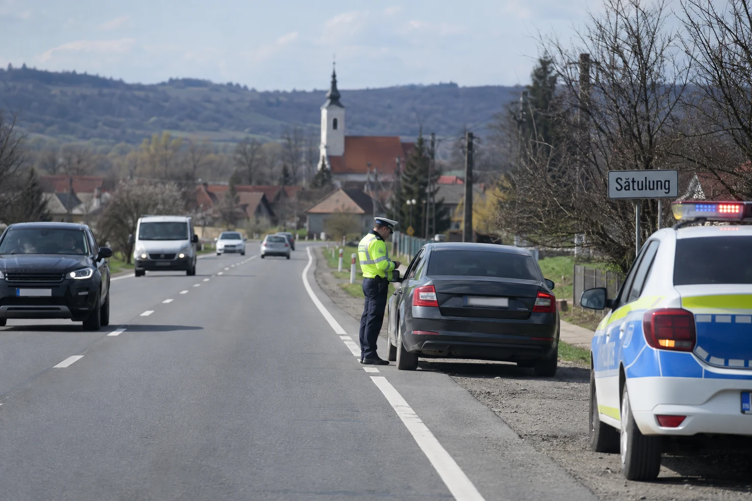 DN 1C la Satulung: șofer cu permisul suspendat, prins și la depășire ilegală